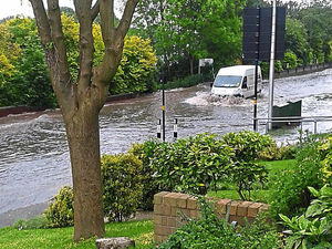 Supporting image for story: Tipton 'raging river' road reopens