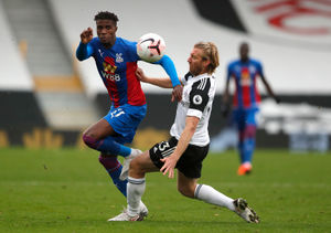 Crystal Palace's Wilfried Zaha (left) and Fulham's Tim Ream