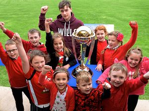 Supporting image for story: World Cup comes to
club of two countries