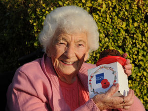 Supporting image for story: Centenarian sent Christmas pudding mixed by Royal Family