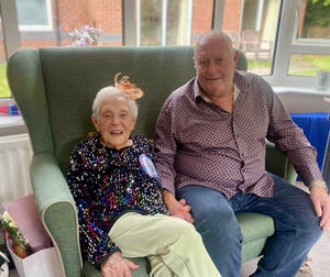 Joyce and her son celebrate together