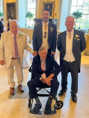 Roy with his son, grandson and relative.