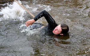 Tess usually swims butterfly but the stream is too shallow