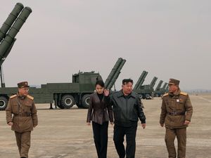 Supporting image for story: North Korean leader Kim observes test of rocket launch systems with daughter