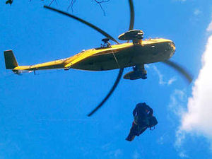 Supporting image for story: Dramatic air rescue of climber after 30ft plunge