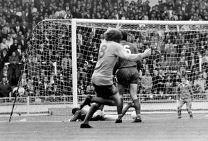 The FA Challenge Trophy Final played at Wembley on Saturday, May 1, 1971, between Telford United and Hillingdon. Telford came from 2-0 down to win 3-2. This picture shows the goal scored by Joey Owen which began the Telford United comeback. The caption read: '...the ball nestling in the net and Hillingdon keeper Lowe flat out and beaten for Telford's first goal.'