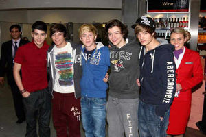 Supporting image for story: X Factor's One Direction mobbed at airport