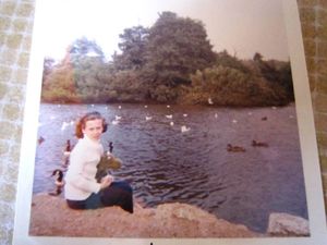 Katharine Shearing with her Merrythought as a child and then again at the Merrythought shop in 2012  