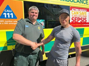 Darren Harris with paramedic Gary Williams