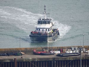 A group of people thought to be migrants are brought in to Dover, Kent, on board a Border Force vessel