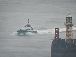 A group of people thought to be migrants are brought in to Dover on board a Border Force vessel