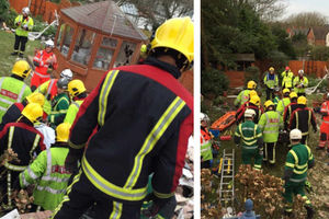 Pictures from @wmashart show the moment the woman was carried away from the rubble of her house