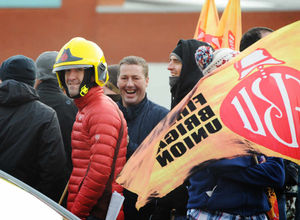 Firefighter Andy Shaw of Willenhall (wearing the helmet)