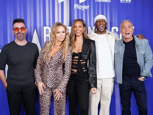 Simon Cowell, Amanda Holden, Alesha Dixon, KSI and Bruno Tonioli standing in a line, smiling