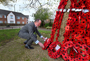 Eddie Hughes MP lays a wreath at the Blakenall Peace Tree