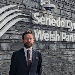 Cllr Ben Gwalchmai outside the Senedd