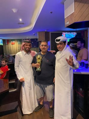 Jassa Dehal, from Wolverhampton pictured with two Qatari locals 