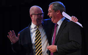 Paul Nuttall, left, is congratulated by Nigel Farage after he was announced as the new Ukip leader