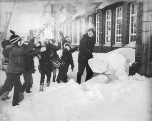 Caretaker Jack Sadler joins in the fun during the heavy snow at Cronehills Junior and Infant school in West Bromwich 