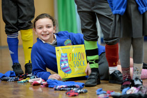 Pictured with odd socks is student Holly Shotton