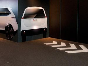 Supporting image for story: Mitsubishi’s new signalling system projects symbols on to the road