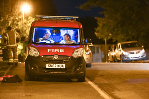 Fire investigators at the scene. Photo: SnapperSK