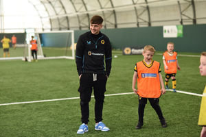 Luke Cundle with the youngsters. Photo: Dave Bagnall