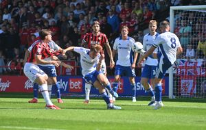 Walsall defender Mason Hancock watches Evan Weir's stunning free-kick sail into the top corner against Swindon on Saturday.