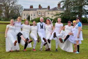 Dave Allen, from Wednesbury, with his bride-to-be Karen Bill and their friends, left to right, Kerry Bennion, Emily Williams, Fern Millard, Nicola Jones, Maddie Hards, Lisa Butler, Jo Kilvington and Ali Lee ahead of the mud run