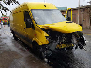 Supporting image for story: PICTURES: Sandwell road junction 'covered in oil' after van and car collide