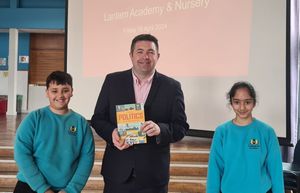 Councillor Shaun Davies with head boy Adam Din and head girl Mihika Pathania