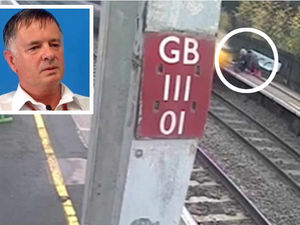 Supporting image for story: Inches from death: Watch the moment a 100mph train narrowly misses a girl on the rails