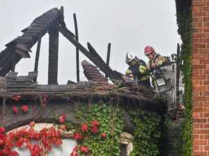 Supporting image for story: Fire crews fighting Shrewsbury pub blaze forced to ground drone due to 'public interference'