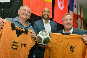 Former Wolves players Steve Kindon (left), Matt Murray (centre) and Steve Daley (right) show off the Wolves-themed raffle prizes. 
