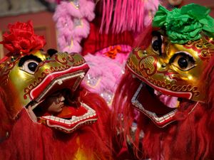 Chinese artists perform a lion dance