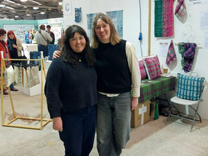 Nancy Una Simmons (left) and Rachel Thomas in front of their stands at Wonderwool Wales.