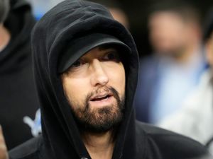 Supporting image for story: Eminem reveals he will become a grandfather in emotional music video