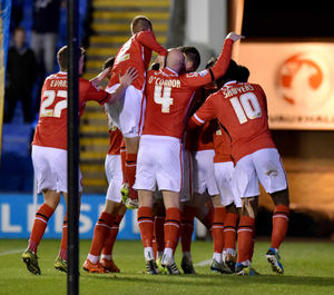 Jordan Cook celebrates his goal