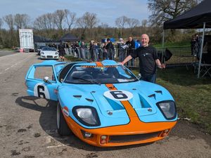 Supporting image for story: Church volunteer surprised with high-speed car racing experience