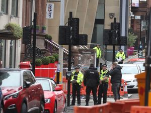 Police at the scene of the stabbings in Glasgow