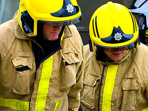 Supporting image for story: Fire crew winches hatchback out of hedge in village