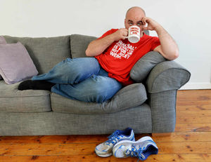 Graeme Brooks takes a rest at his dad's Bloxwich home after his 138 mile charity walk from Walsall to Wembley