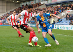 Jordan Willis of Sunderland and Shaun Whalley of Shrewsbury Town (AMA)