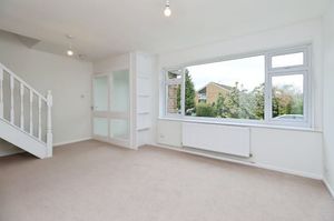 There's a bright and airy living room at the heart of the home