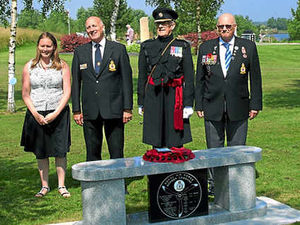 Supporting image for story: Hero airman's memorial bench unveiled