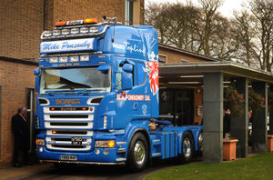 The former trucker arrives by lorry at Bushbury Crematorium