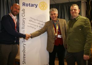 Caption: Shrewsbury Severn Rotary Club president Johnathan Callwood congratulates Dan Blansczyk (left) and Steve McAlinden of Shrewsbury Colleges Group on their induction as a corporate member.
