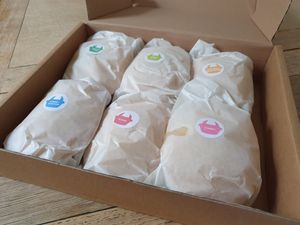 The six pies arrive in a box sent by courier