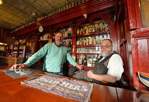 Head brewer Paul Cooksey and licensee Tim Newey behind the bar at the Old Swan