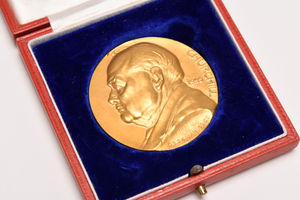 A 22ct gold Winston Churchill commemorative medallion which sold for £6,700
